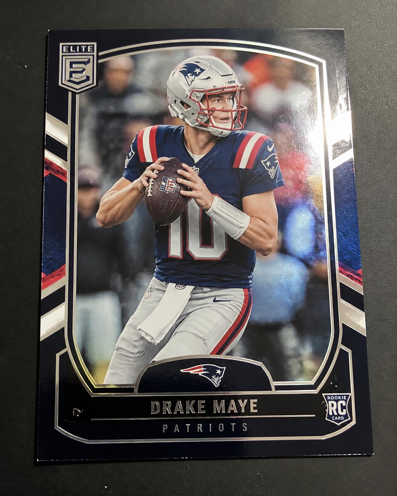 An ordinary phone photograph of a trading card lying on a desk